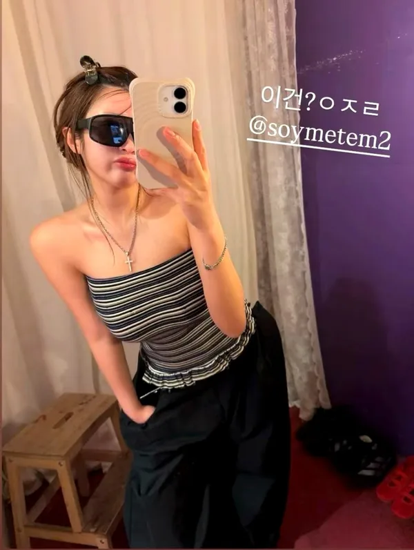 Stylish Striped Sleeveless Top, Showcasing Elegant Charm